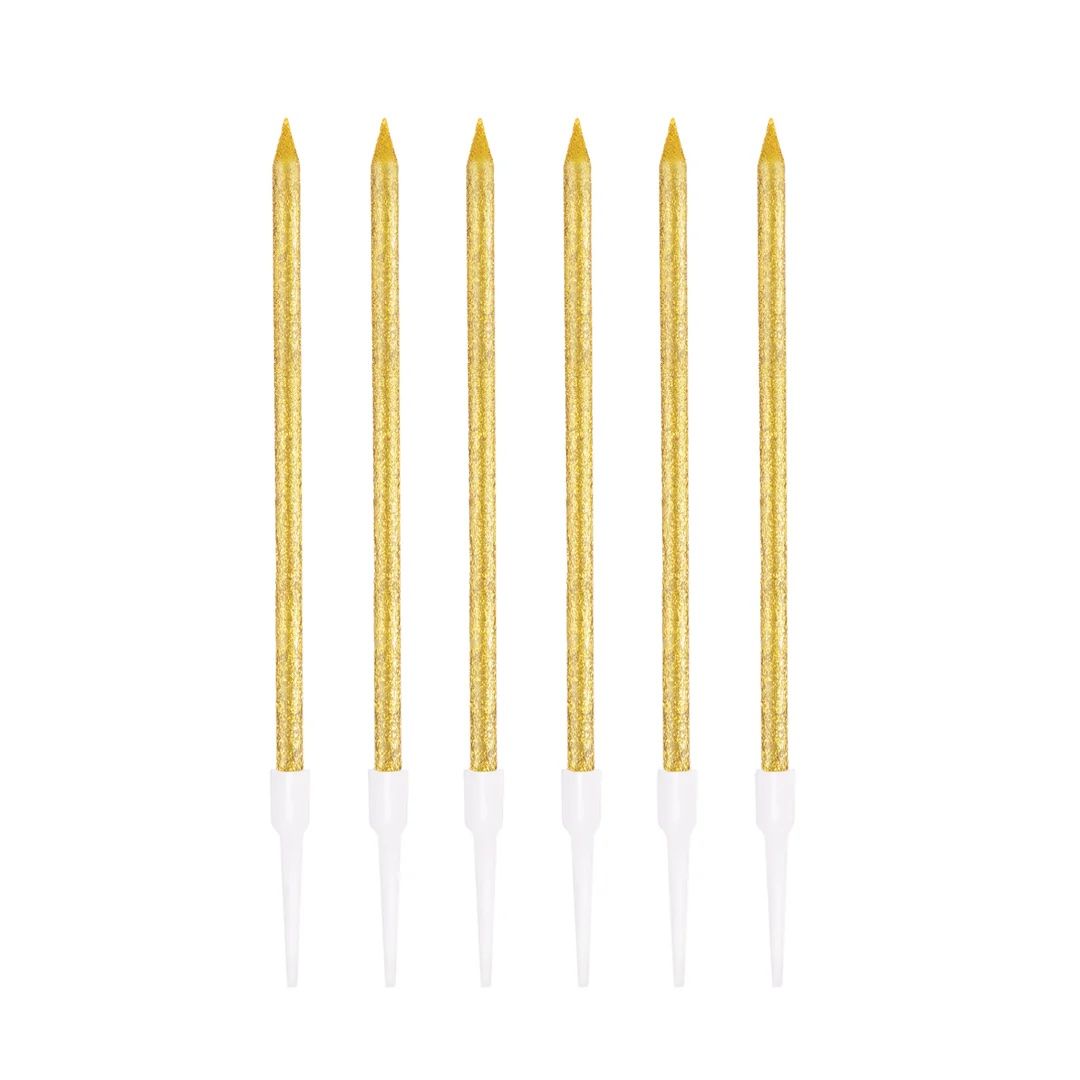 velas rectas largas doradas